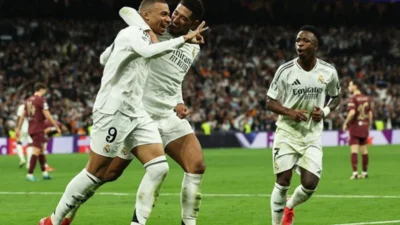 Vinicius Jr Cetak Brace, Real Madrid Singkirkan Manchester City di 16 Besar Liga Champions