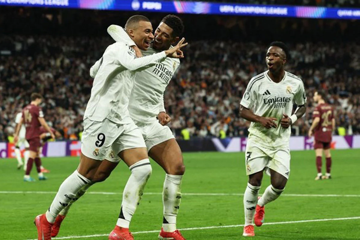 Vinicius Jr Cetak Brace, Real Madrid Singkirkan Manchester City di 16 Besar Liga Champions